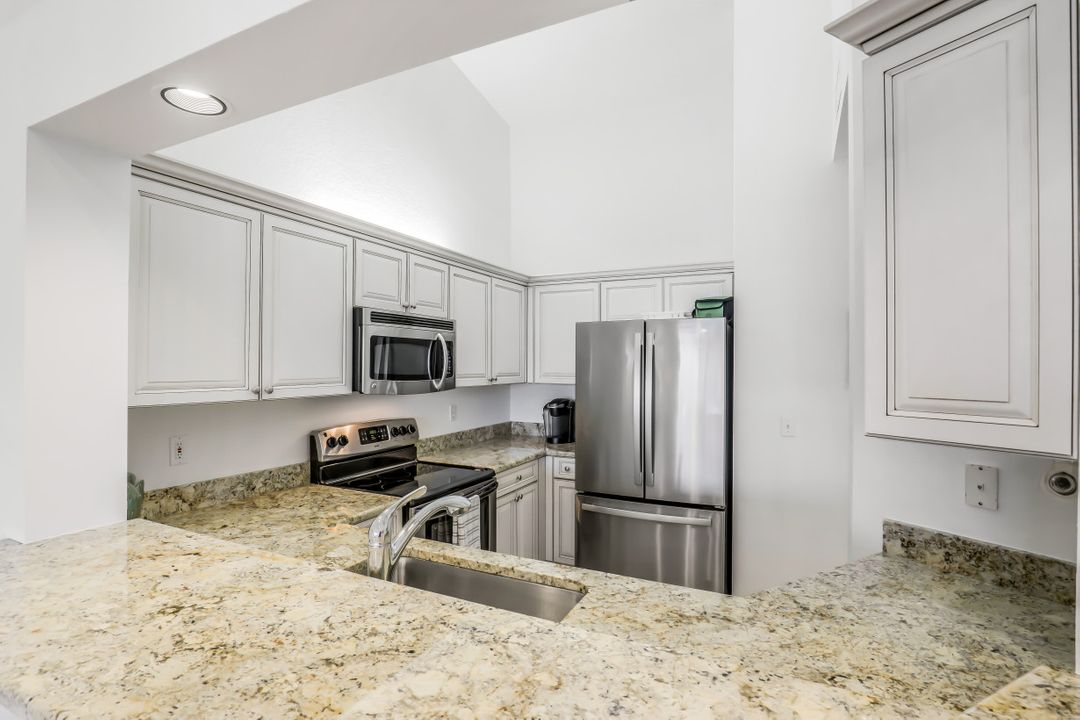 7734 Pebble Creek Cir #303, Naples, FL 34108