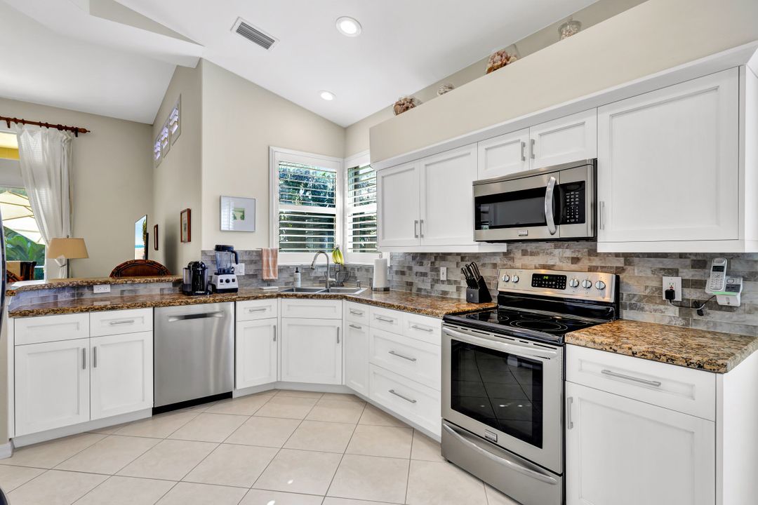 1753 Winding Oaks Way, Naples, FL 34109