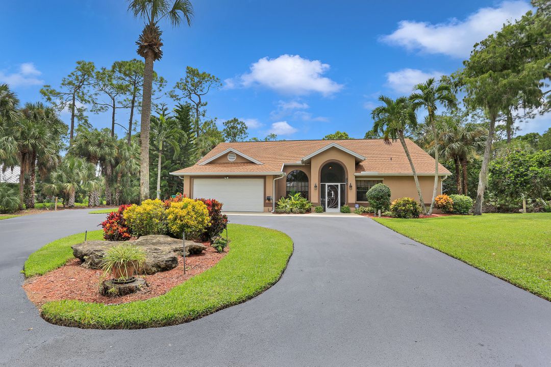 5980 Hidden Oaks Ln, Naples, FL 34119