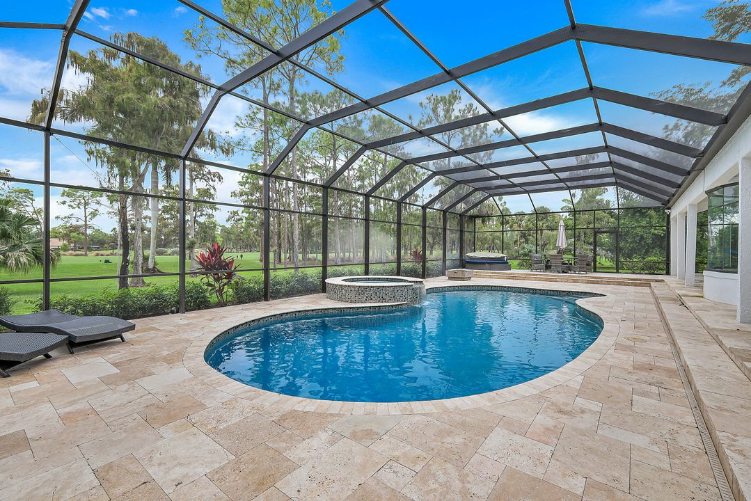 13087 Pond Apple Dr E, Naples, FL 34119