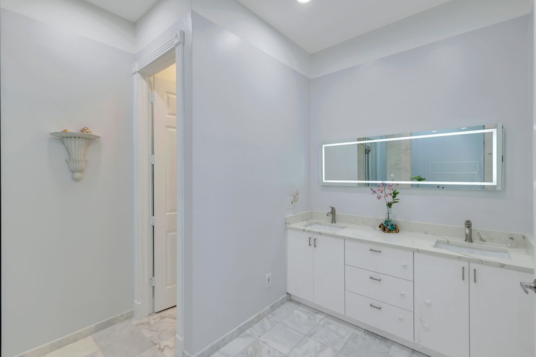 5847 Whisperwood Ct, Naples, FL 34110