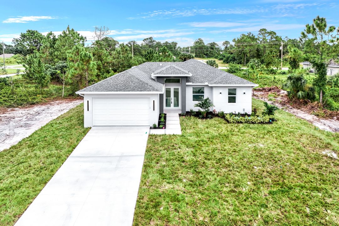 833 Da Vinci Ave S, Lehigh Acres, FL 33974