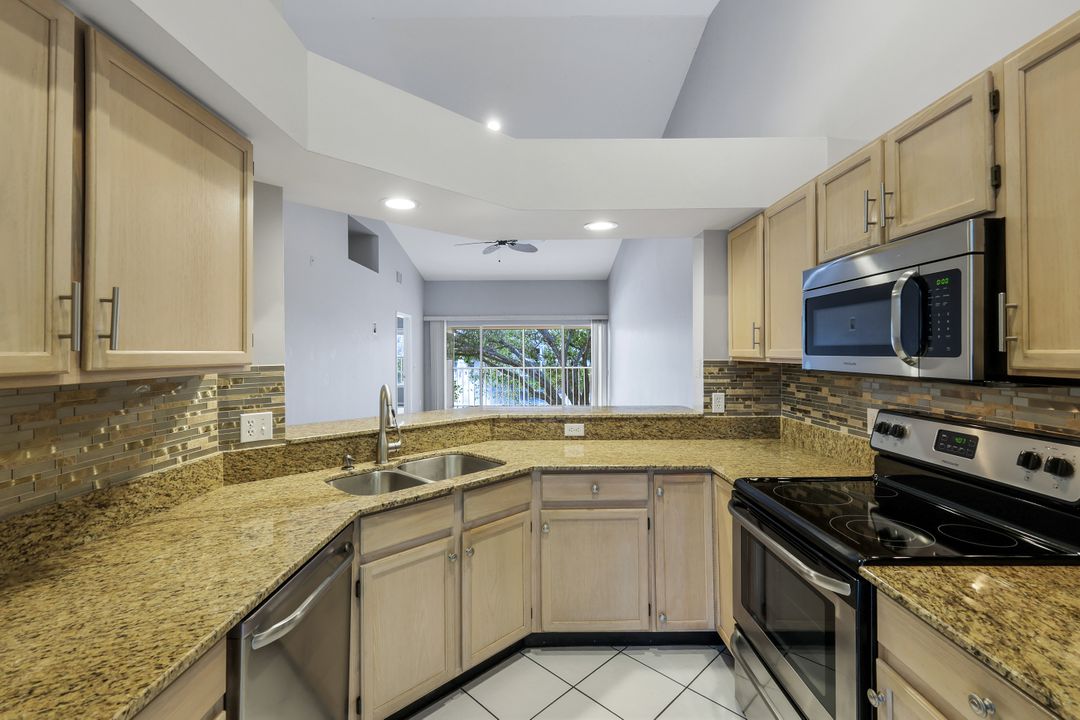 760 Wiggins Lake Dr #203, Naples, FL 34110