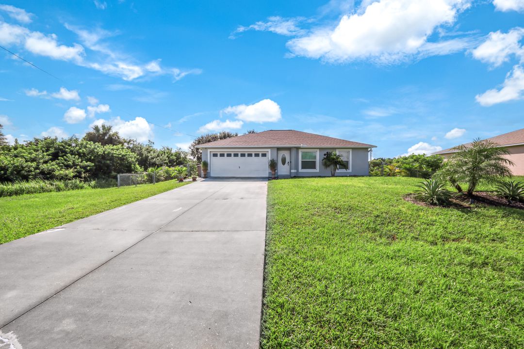 515 Peerless Cir, Lehigh Acres, FL 33974