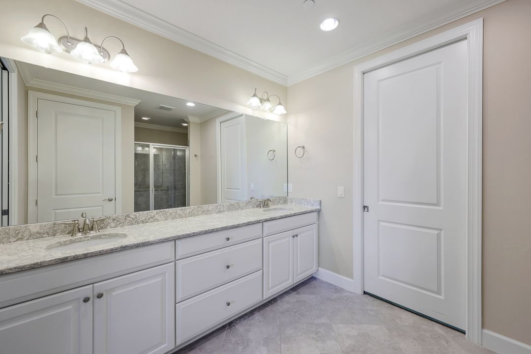 8765 Bellano Ct #103, Naples, FL 34119