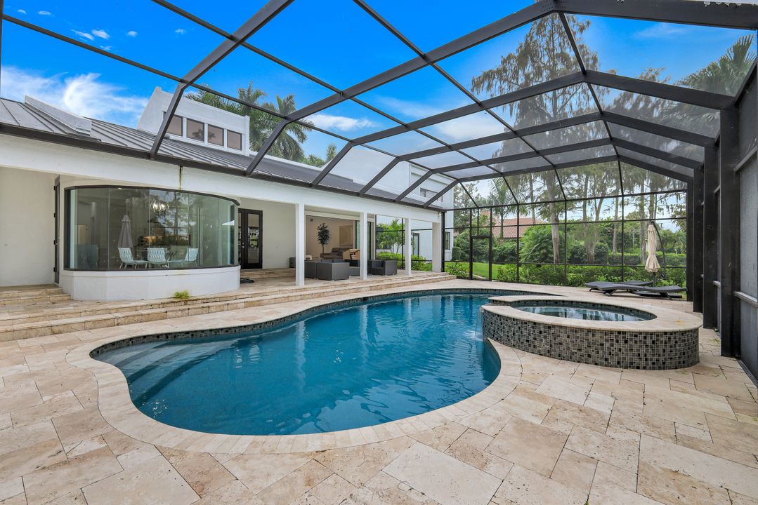 13087 Pond Apple Dr E, Naples, FL 34119