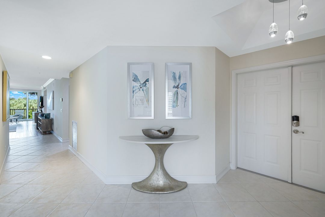 7687 Pebble Creek Cir #201, Naples, FL 34108