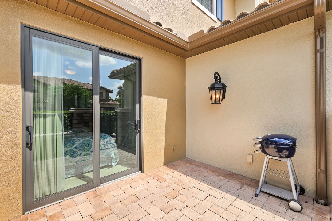 8761 Bellano Ct  #104, Naples, FL 34119