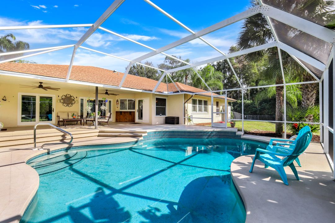 6110 Spanish Oaks Ln, Naples, FL 34119