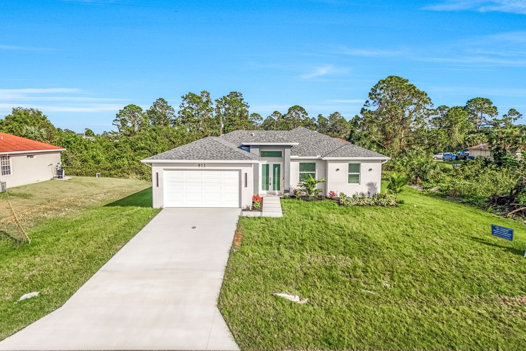 911 Mercury Ave S, Lehigh Acres, FL 33974