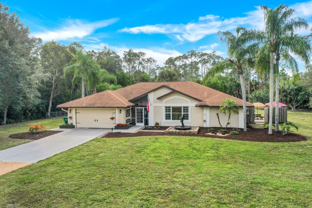 6110 Spanish Oaks Ln, Naples, FL 34119