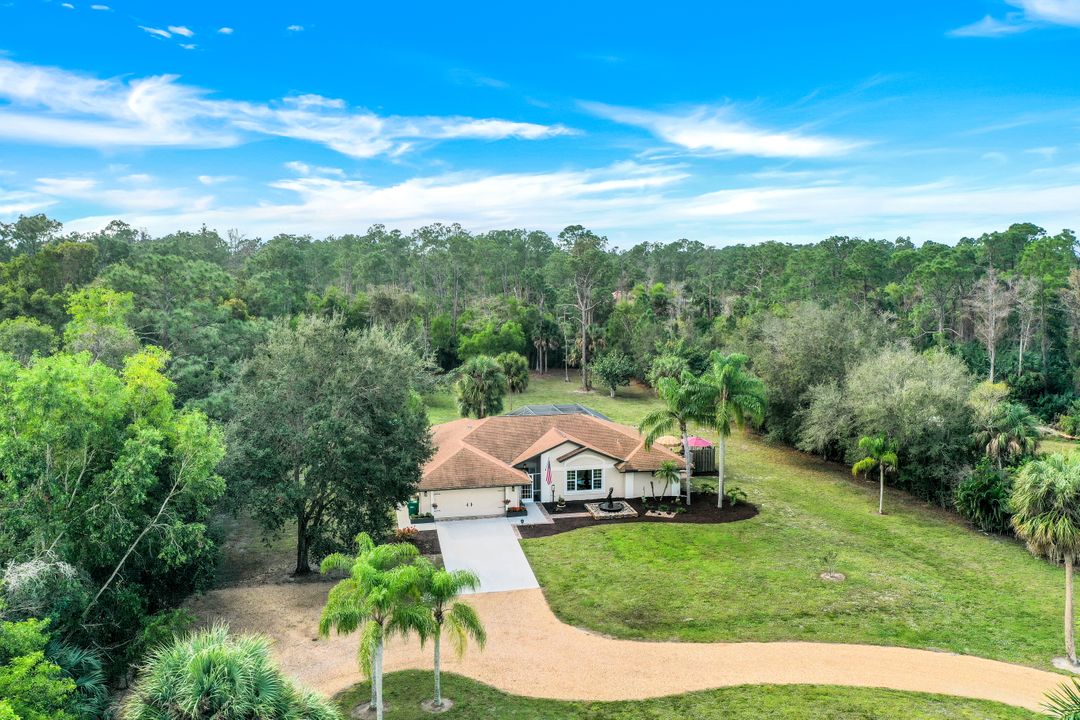 6110 Spanish Oaks Ln, Naples, FL 34119