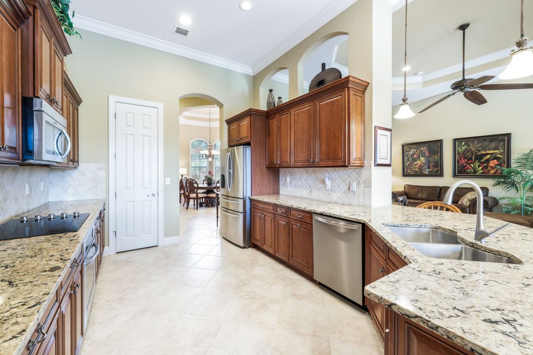 9388 Copper Rock Ct, Naples, FL 34120