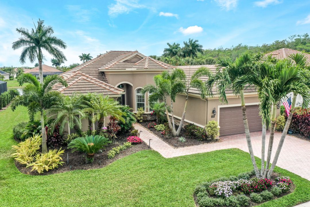 9388 Copper Rock Ct, Naples, FL 34120